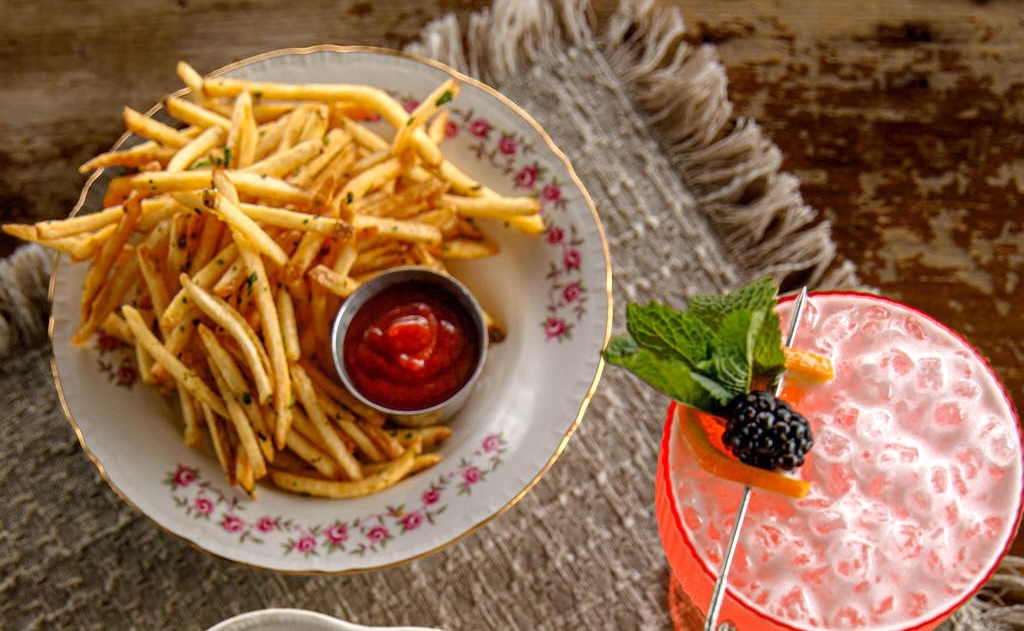 DEN_Cinq à Sept_Boulder_fries - DiningOut Pair anything at Cinq à Sept with a plate of fries and a cocktail. | Photo courtesy of Cinq à Sept
