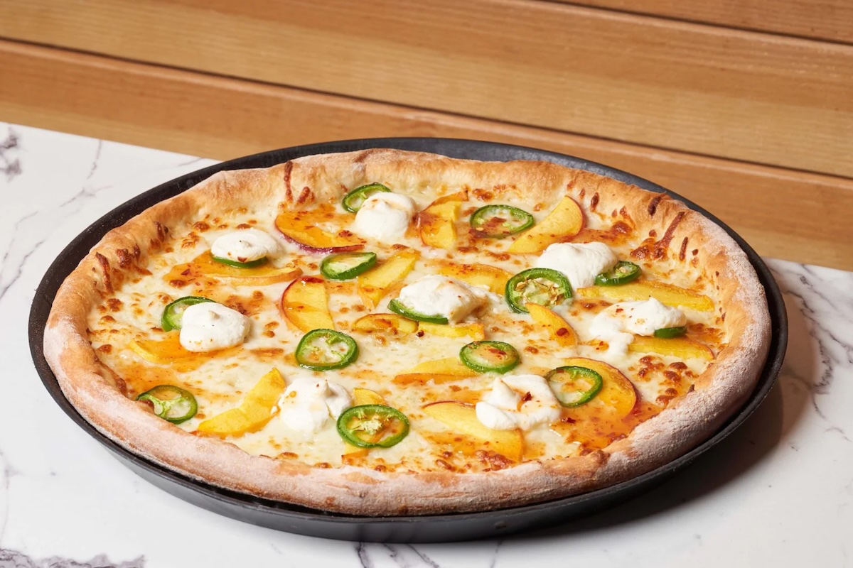 Peach pizza is on the menu. | Photo courtesy of Homegrown Tap & Dough