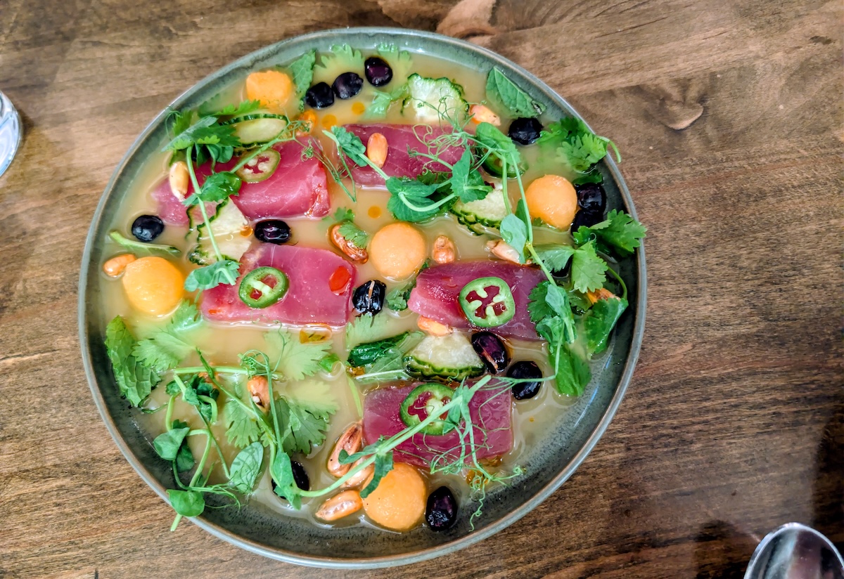The Tiradito with tuna, leche de tigre de melon, pepino, and herbs at Lucina. | Photo by Linnea Covington