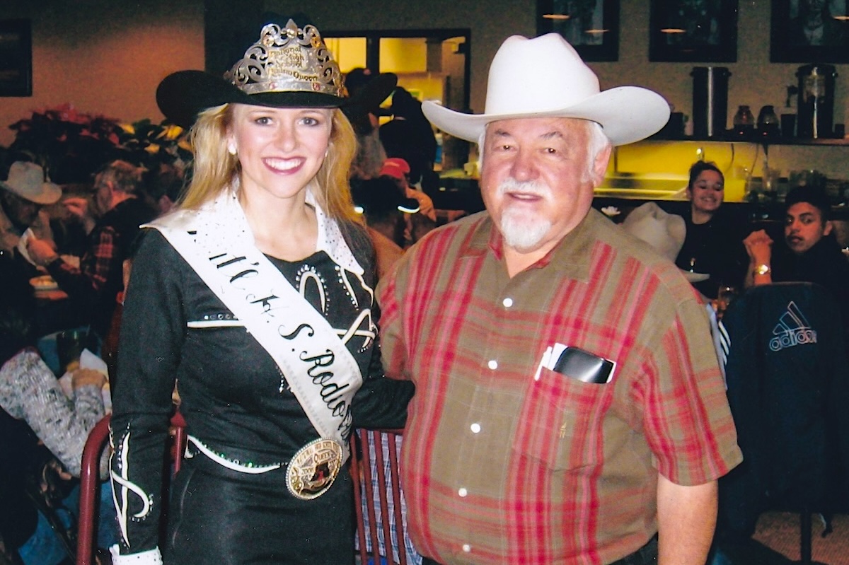 DEN_Mickey_with_Stock_Show_rodeo_queen - DiningOut Mickey Broncucia with a Stock Show rodeo queen. | Photo courtesy of Micky's Top Sirloin