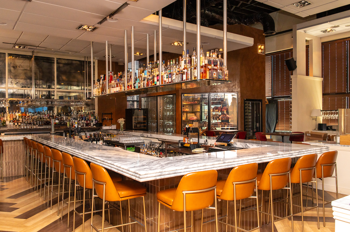 The bar at Doris Metropolitan comes alive during its popular Monday happy hour. | Photo by Doris Metropolitan