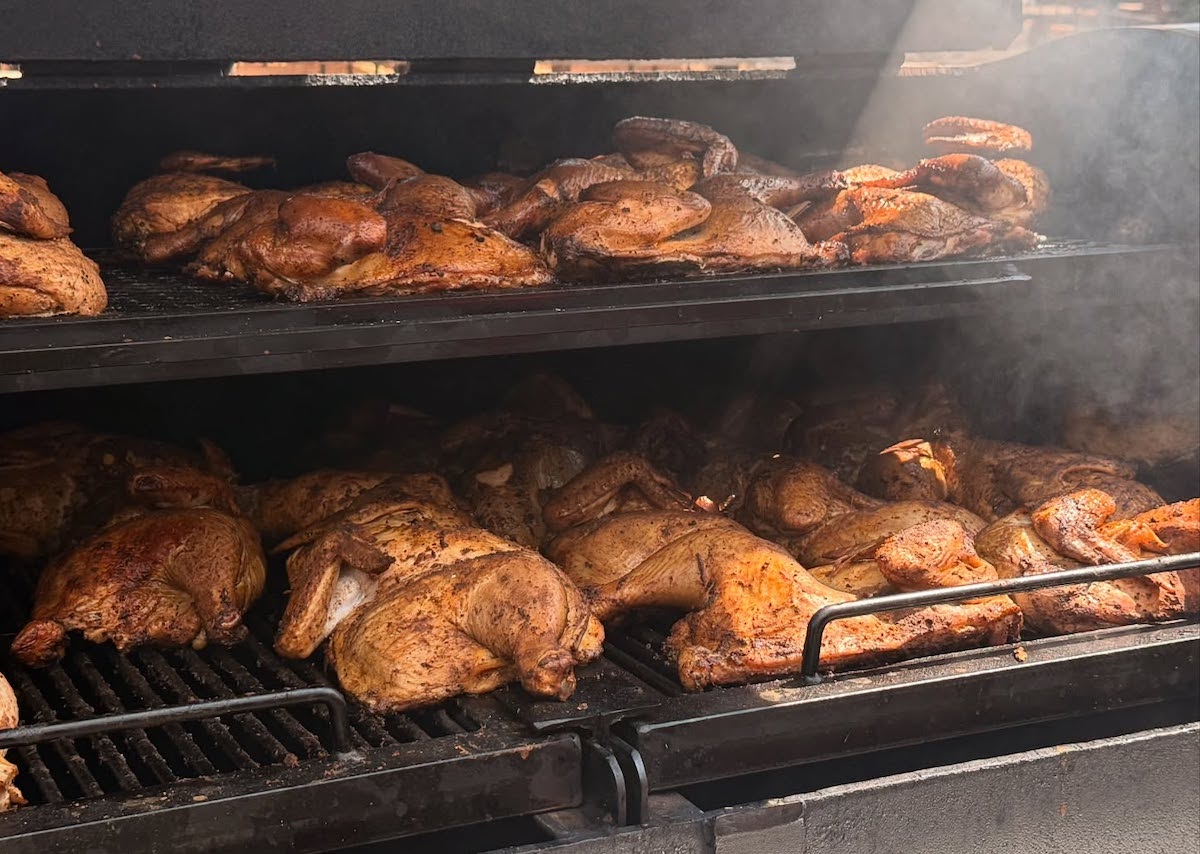 Frazie’s Meat & Market - DiningOut Whole chickens smoke low and slow at Frazie's Meat & Market, where barbecue is as much a craft as butchery. | Photo by Frazie’s Meat & Market