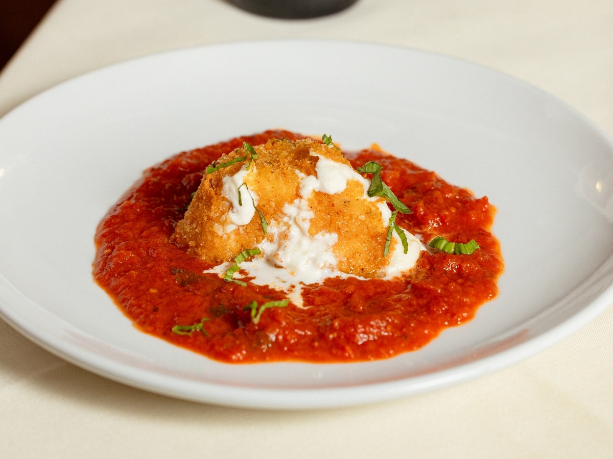 Crispy fried burrata over slow-roasted tomato sauce opens Marvino's five-course Italian Wine Dinner. | Photo by Grupo Herrera Restaurants