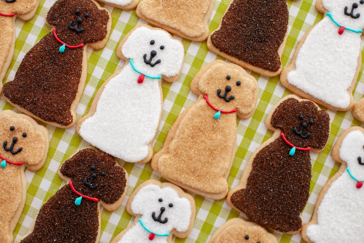 SusieCakes - DiningOut SusieCakes' limited-time Dog Days of Summer collection includes adorable dog-shaped Frosted Sugar Cookies, with $1 from each cookie sold benefiting local animal shelters and rescue organizations throughout August. | Photo by SusieCakes
