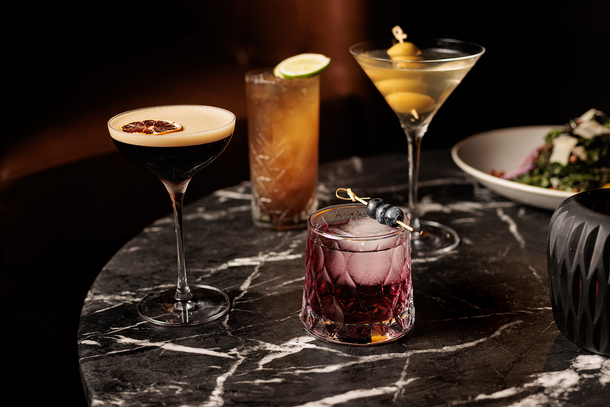 Archer, the new cocktail bar inside Plano's Clara Hotel, pairs classic cocktails with an intimate, late-night atmosphere designed for lingering over drinks. | Photo by Dan Padgett