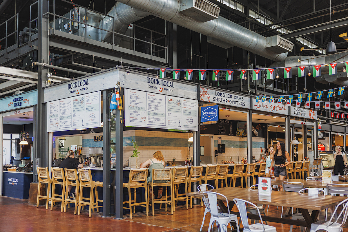 Dock Local has opened its fourth North Texas location at the Dallas Farmers Market, bringing fresh seafood, lobster rolls, oysters, and cocktails to the bustling food hall. | Photo by Samantha Marie Photography