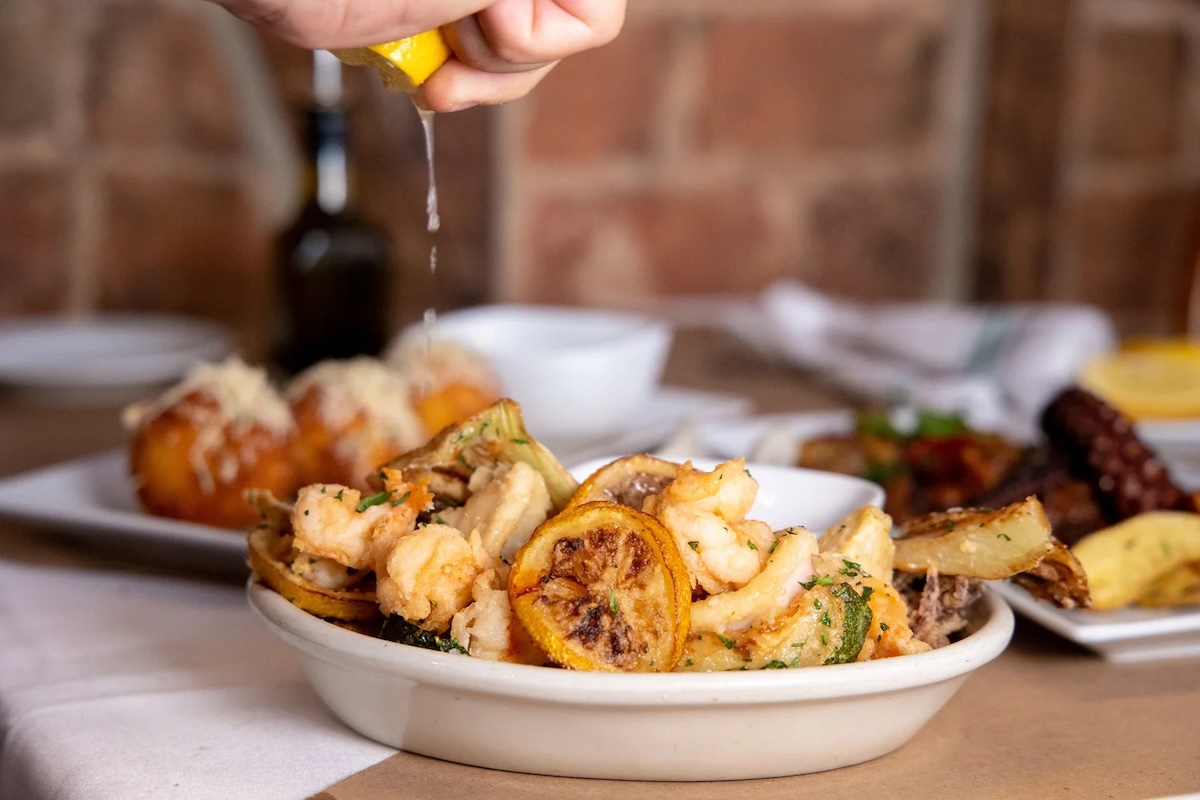 Pick a perfect fried calamari dish to start with. | Photo courtesy of Giovanni’s Brooklyn Eats 