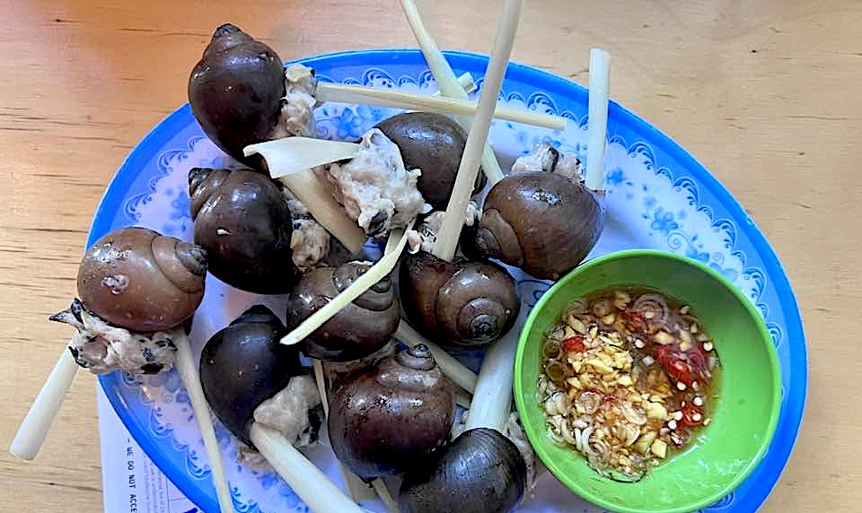 The Ốc Bươu Nhồi Thịt, aka stuffed snails with lemongrass and pork. | Photo courtesy of Mắm