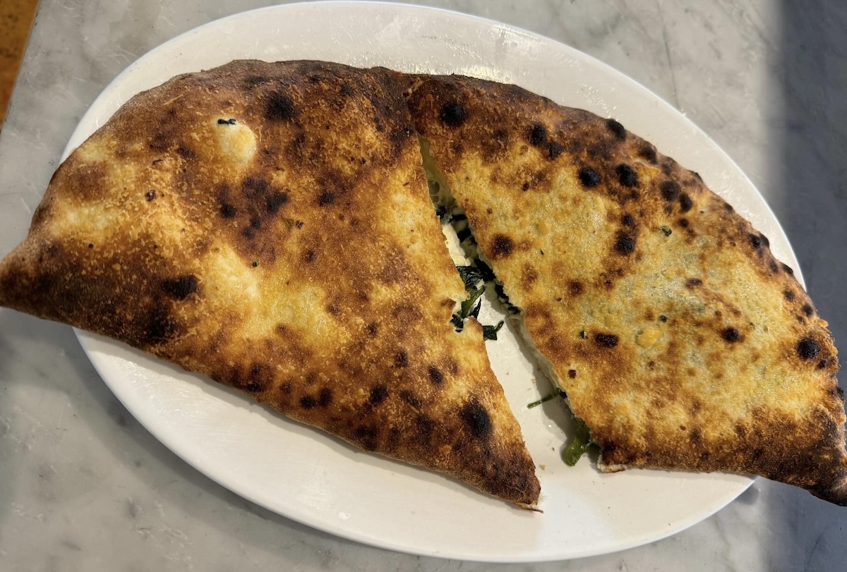 A ricotta and spinach calzone from La Villa Pizzeria. | Photo courtesy of La Villa Pizzeria 