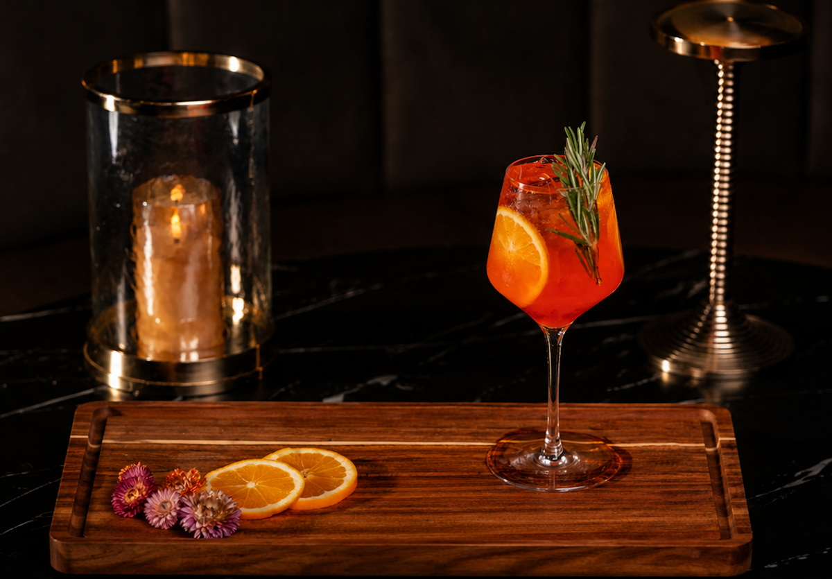 Bright, bubbly and made for golden hour, the Otium Spritz combines Select Aperitivo, white peach purée, prosecco and soda for the lounge's signature take on Italy's quintessential aperitivo. | Photo by Otium