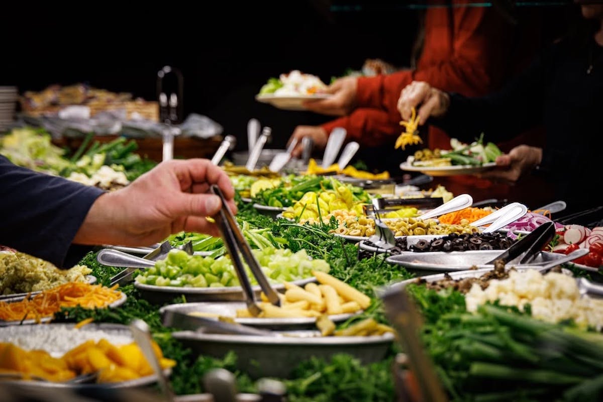 The Peddler - DiningOut The Peddler Steakhouse's legendary salad bar has remained a guest favorite for decades, offering dozens of fresh toppings alongside every steak dinner. | Photo by The Peddler