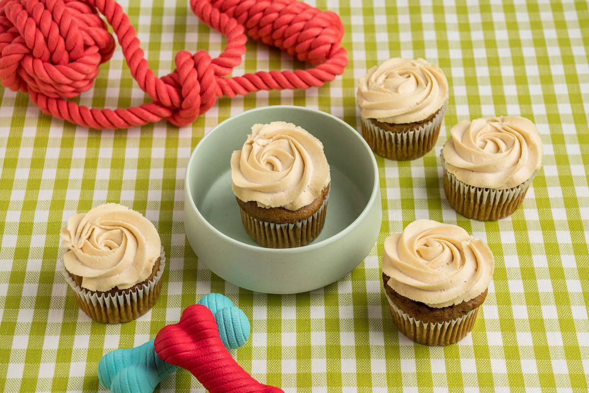 Made with banana, peanut butter, and peanut butter whipped cream, SusieCakes' dog-friendly PupCakes are back for National Dog Day—and $1 from every PupCake sold supports local animal rescue groups. | Photo by SusieCakes