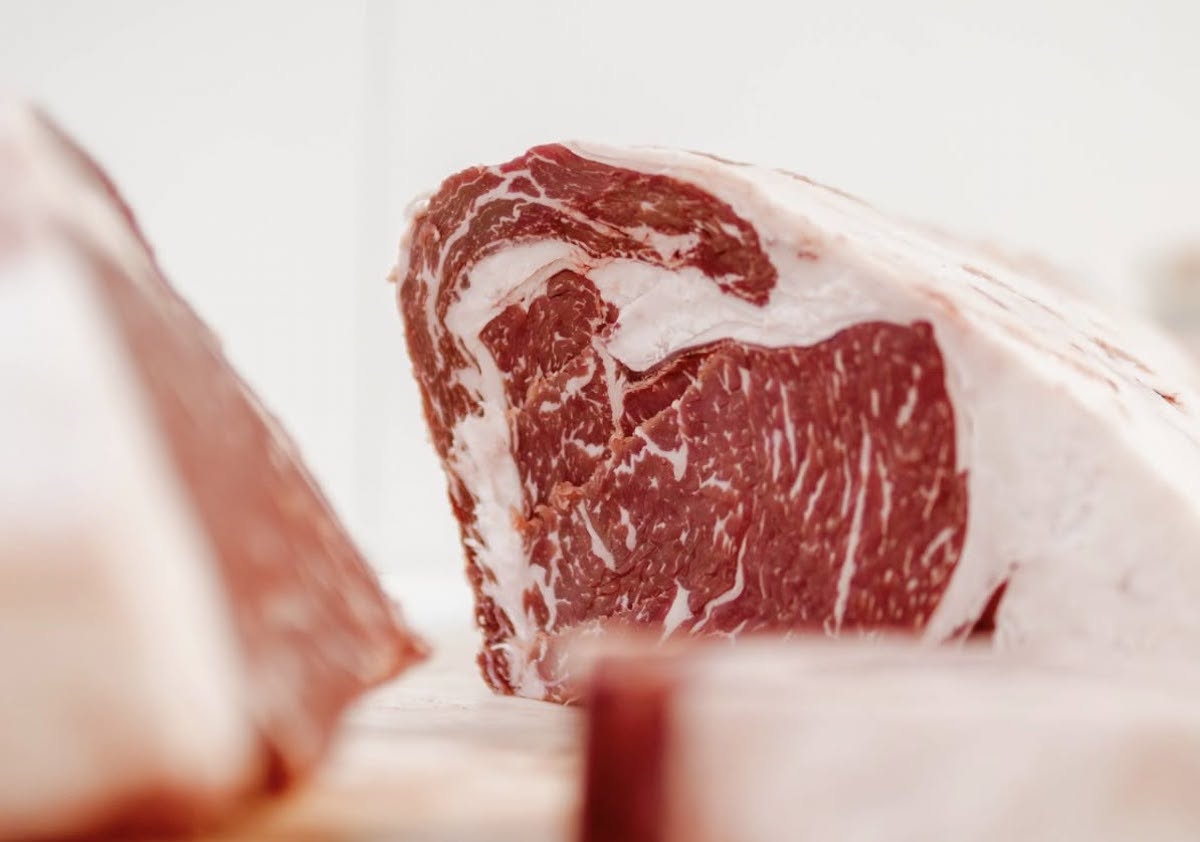Stripling's - DiningOut Well-marbled beef ages to perfection at Stripling's General Store, known for its premium steaks and Southern specialties. | Photo by Stripling's