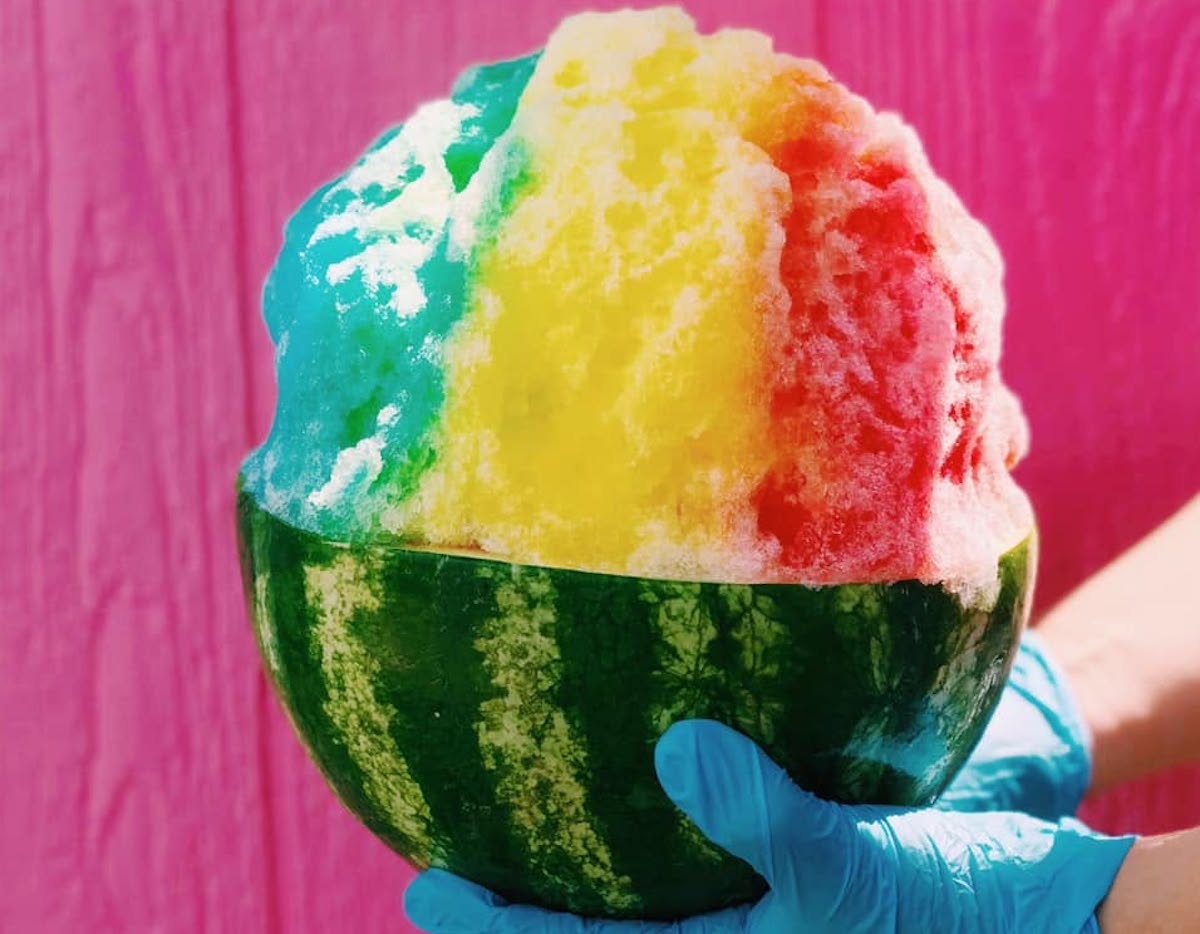 Sweetyz - DiningOut Sweety'z serves giant rainbow shaved ice inside a hollowed-out watermelon for a refreshing treat that's as fun to photograph as it is to eat. | Photo by Sweety'z