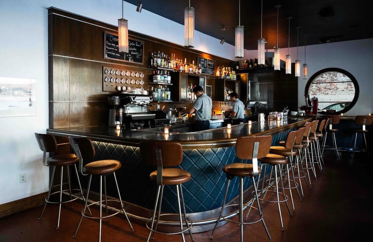 Housed inside a beautifully restored 1938 Greyhound bus terminal, The Grey has become one of Savannah's defining dining destinations. | Photo by the Grey