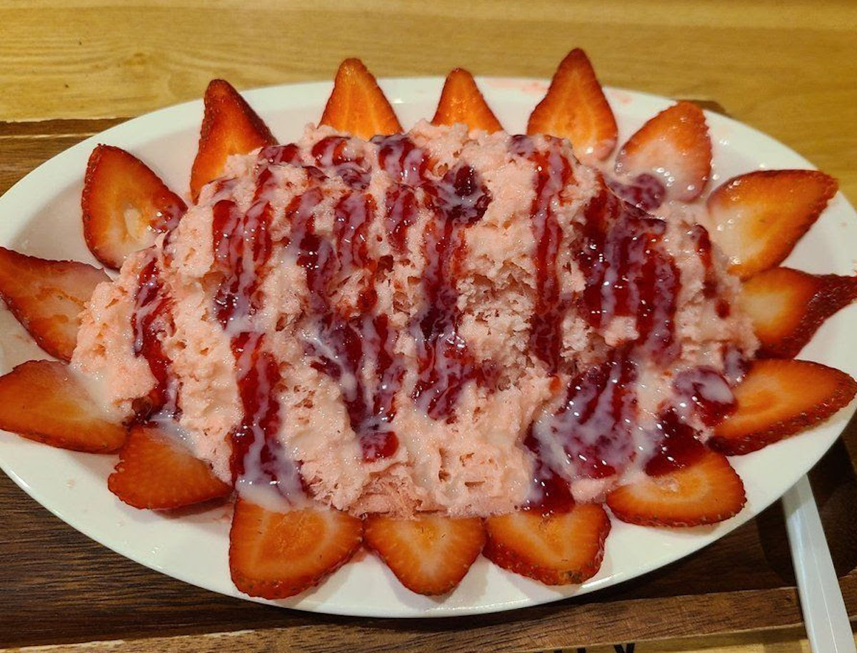 Cocohodo - DiningOut Fresh strawberries, housemade syrup, and a drizzle of sweet cream transform this fluffy shaved ice into a refreshing summertime dessert at Cocohodo. | Photo by Cochodo