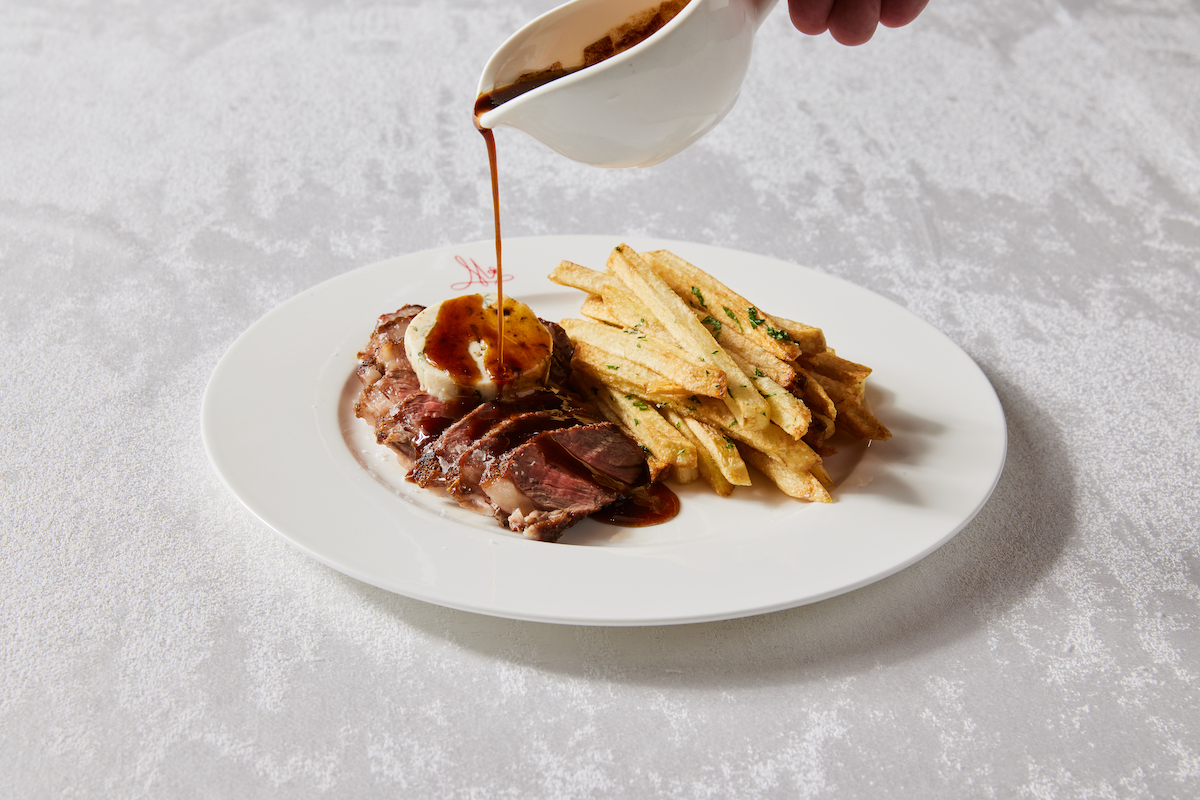 Brasserie Margot keeps the French brasserie classic simple with sirloin and golden frites. | Photo by Kathryn McCrary