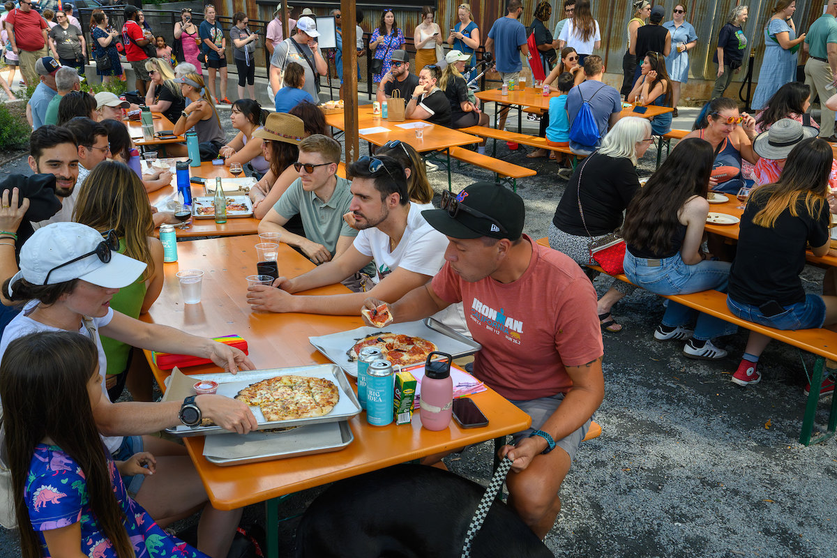 Gluten Freedom Festival ATL - DiningOut Guests dig into gluten-free pizza and drinks at last year’s Gluten Freedom Festival ATL. | Photo by Monday Night Brewing