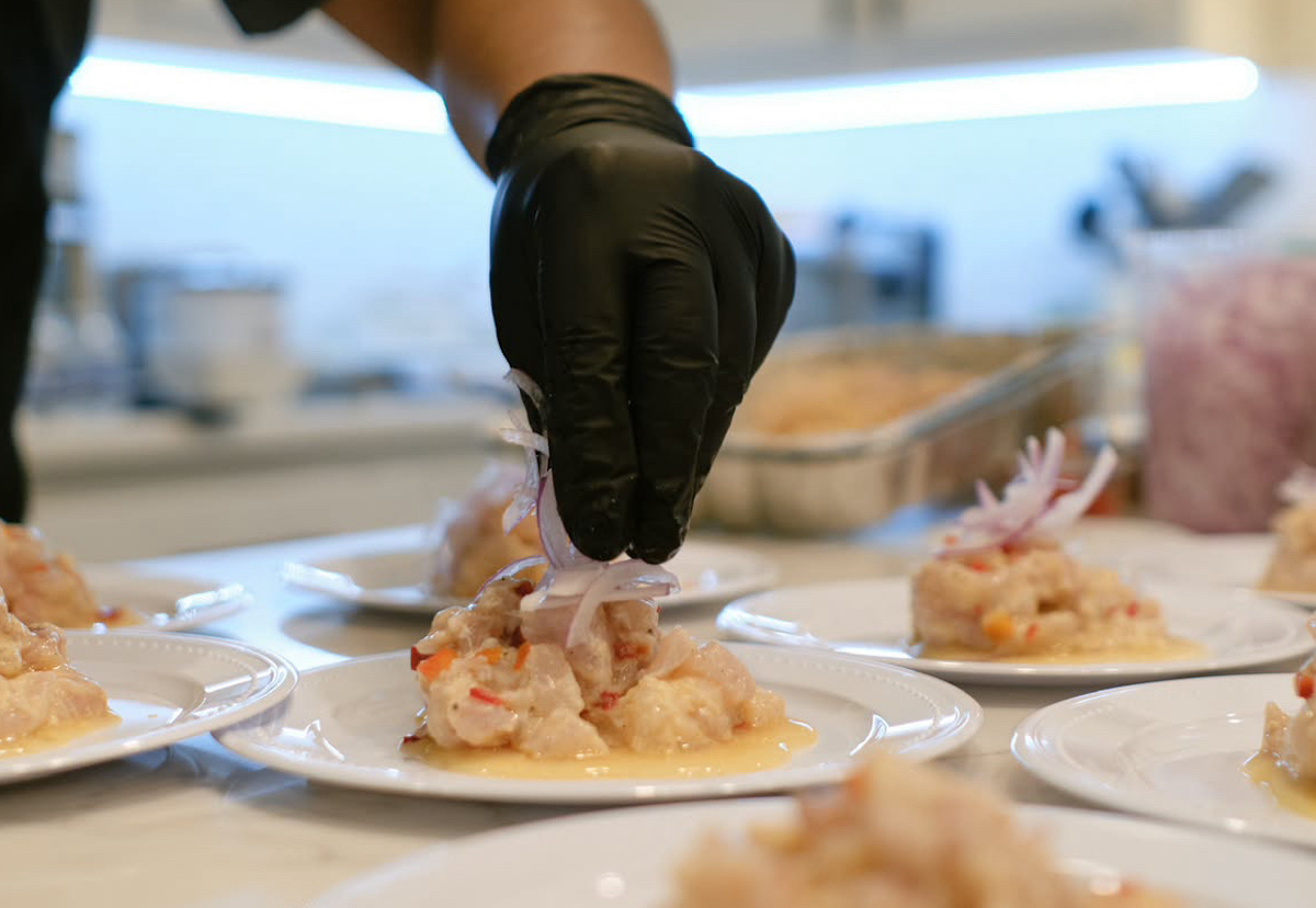 Chef Michael Garcia plates ceviche ahead of his Taste of Peru pop-up at Easy Slider. | Photo by chef Michael Garcia