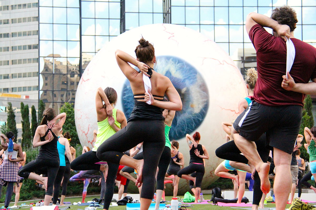 A previous fitness event beside The Eye at The Joule offers a glimpse of the setting for August’s Pilates and Provisions class. | Photo by the Joule