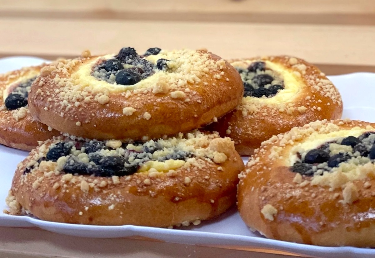 Blueberry-and-cheese kolaches topped with buttery streusel showcase the pastry’s traditional Central European roots. | Photo by Grand Polish Bakery & Store