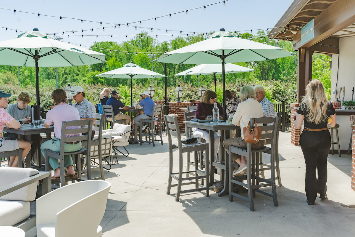 Diners enjoy the patio at Boone’s overlooking Bobby Jones Golf Course, where the restaurant is launching its new weekly Fall Sessions live music series. | Photo by Melle Houston Photo