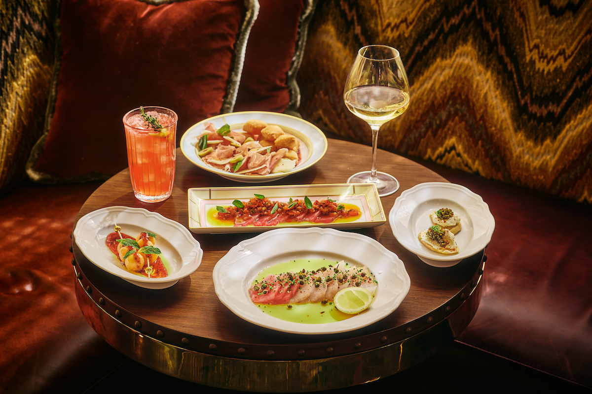 A selection of cicchetti and crudo, paired with wine and cocktails, offers a taste of Scilla’s coastal Italian menu. | Photo by Chase Hall