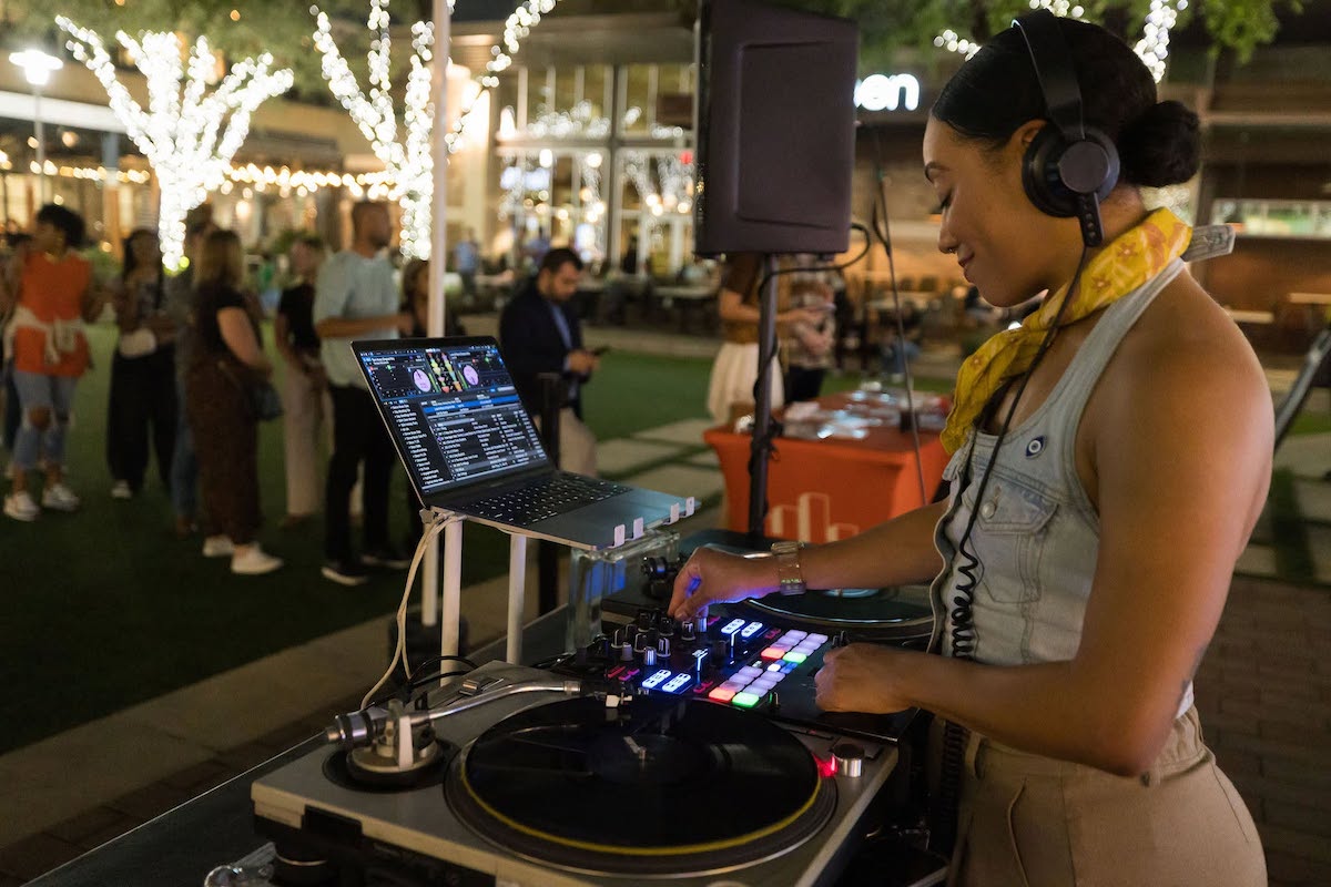 A DJ keeps the energy high as guests make their way through CityCentre during the destination’s walkable food crawl, featuring signature bites and drinks from nine restaurants. | Photo by CityCentre