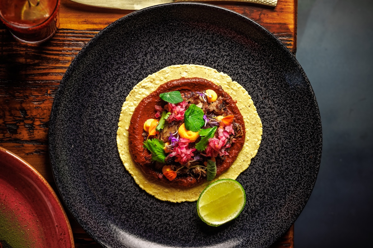 Experience the masa at Xiquita in the Taco de Pato. | Photo by Connor Stehr