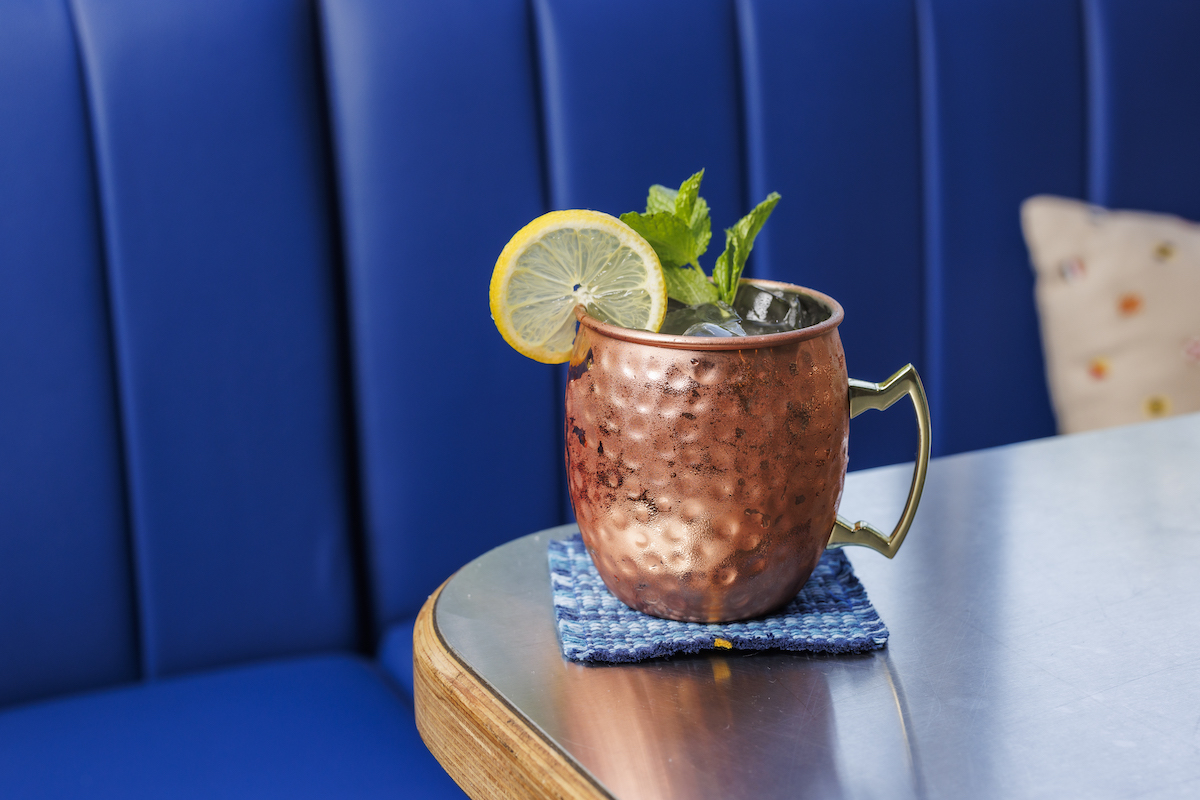 Dock Local's refreshing Lemonade Mule is one of chef M. Brett Curtis' favorite cocktails—and an ideal pairing with the restaurant's coastal-inspired seafood menu. | Photo by Samantha Marie Photography