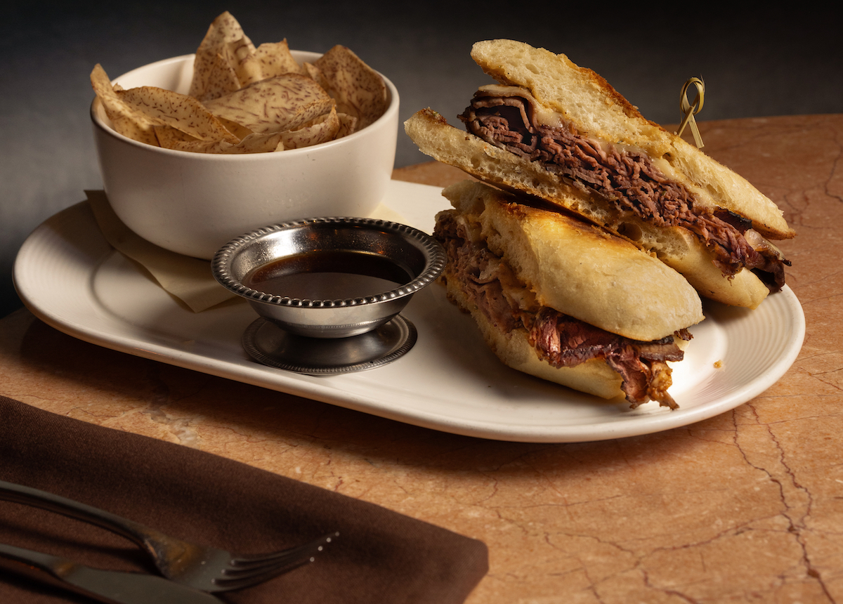Atrium at Ponce City Market has refreshed its menu with new dishes including this French dip served with taro chips. | Photo by Oliva Restaurant Group