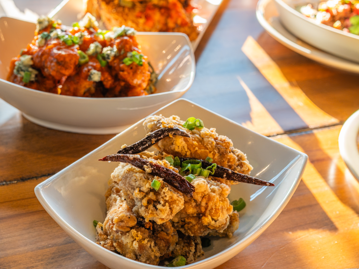 Crispy fried chicken gets a fiery kick at The Landing, chef Tiffany Derry and Tom Foley’s polished gastropub at EpicCentral in Grand Prairie. | Photo by The Landing