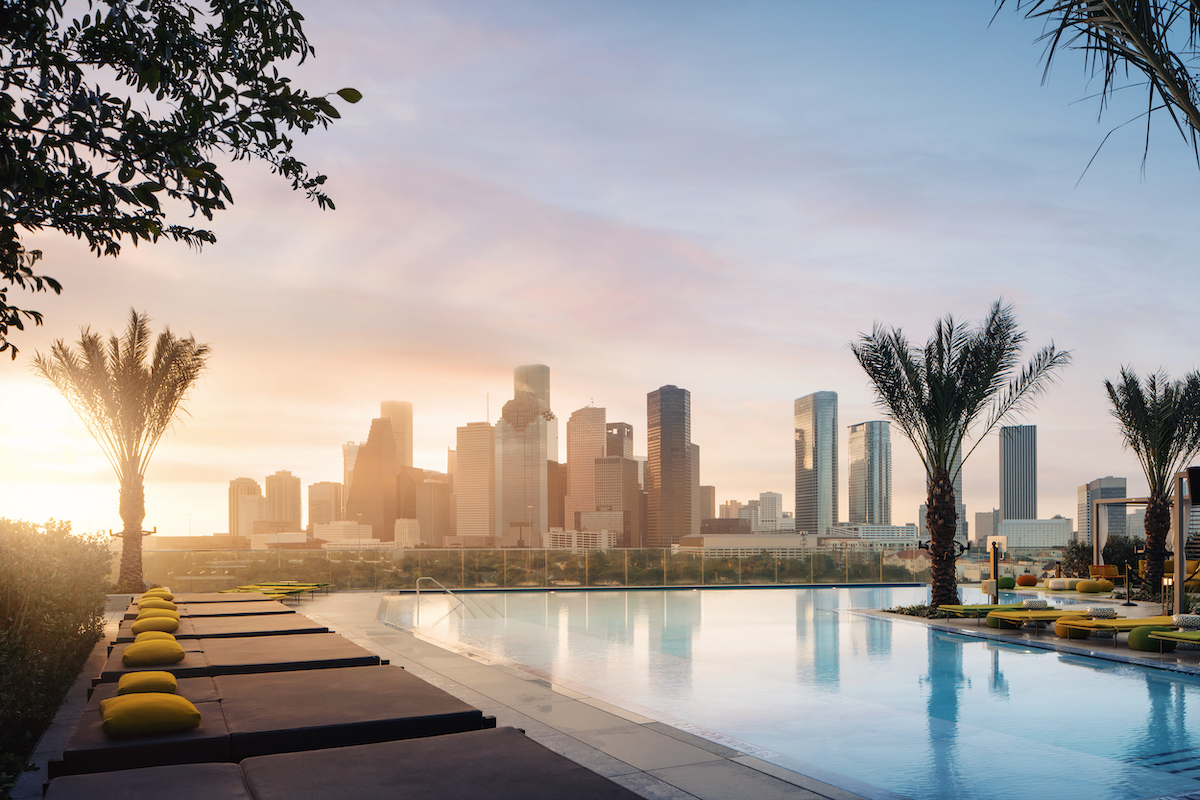 Thompson Houston - DiningOut Thompson Houston’s rooftop pool and skyline views set the scene for the hotel’s Sunday Social series at Sol 7. | Photo by Thompson Houston