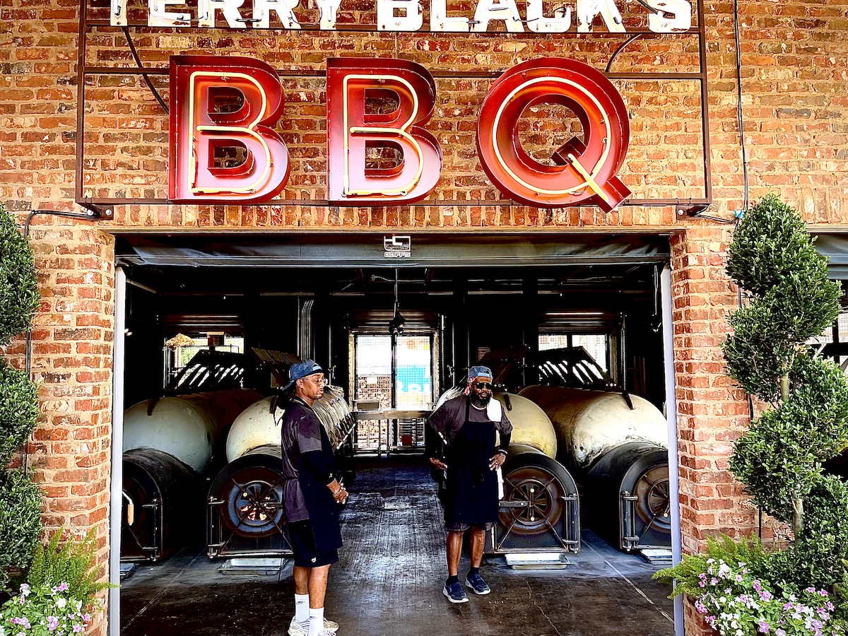 The pit room at Terry Black’s Houston location puts its smokers—and the barbecue process—on full display before guests enter the restaurant. | Photo by Greg Morago