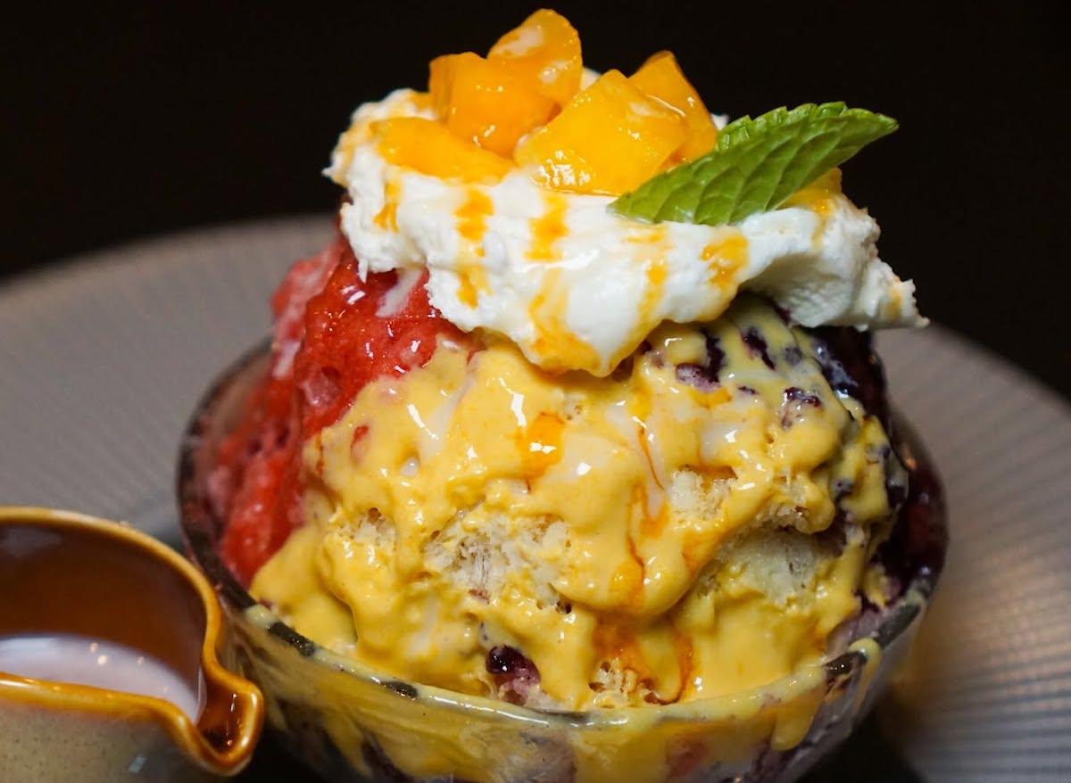 Katami - DiningOut Katami gives Japanese kakigori an elegant spin with a towering mound of finely shaved ice, fruit flavors, fresh mango, and a cloud of cream. | Photo by Katami