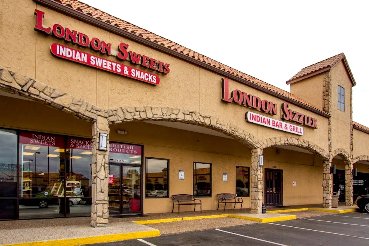 London Sizzler anchors one of the iconic red tile-roofed shopping centers that define Houston's Little India, home to restaurants, markets and sweet shops. | Photo by London Sizzler