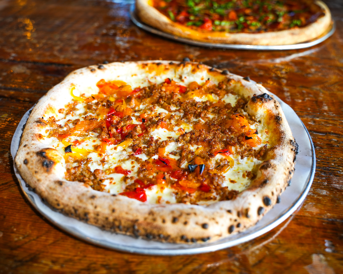 Pizaro’s Mr. SweetPea wood-fired pizza emerges blistered and bubbly from the oven, showcasing the Neapolitan style that helped put the Houston pizzeria on the map. | Photo by Sergio Trevino