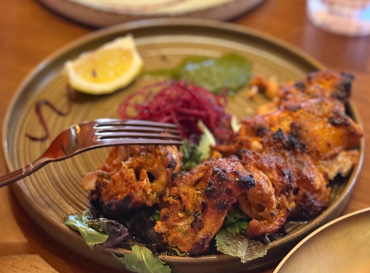 Ikara’s Murg Angaara features boneless chicken seasoned with ginger, garlic, onion and red chile, then lightly fried and finished with lemon juice and kebab masala. | Photo by Sarah Bisacca