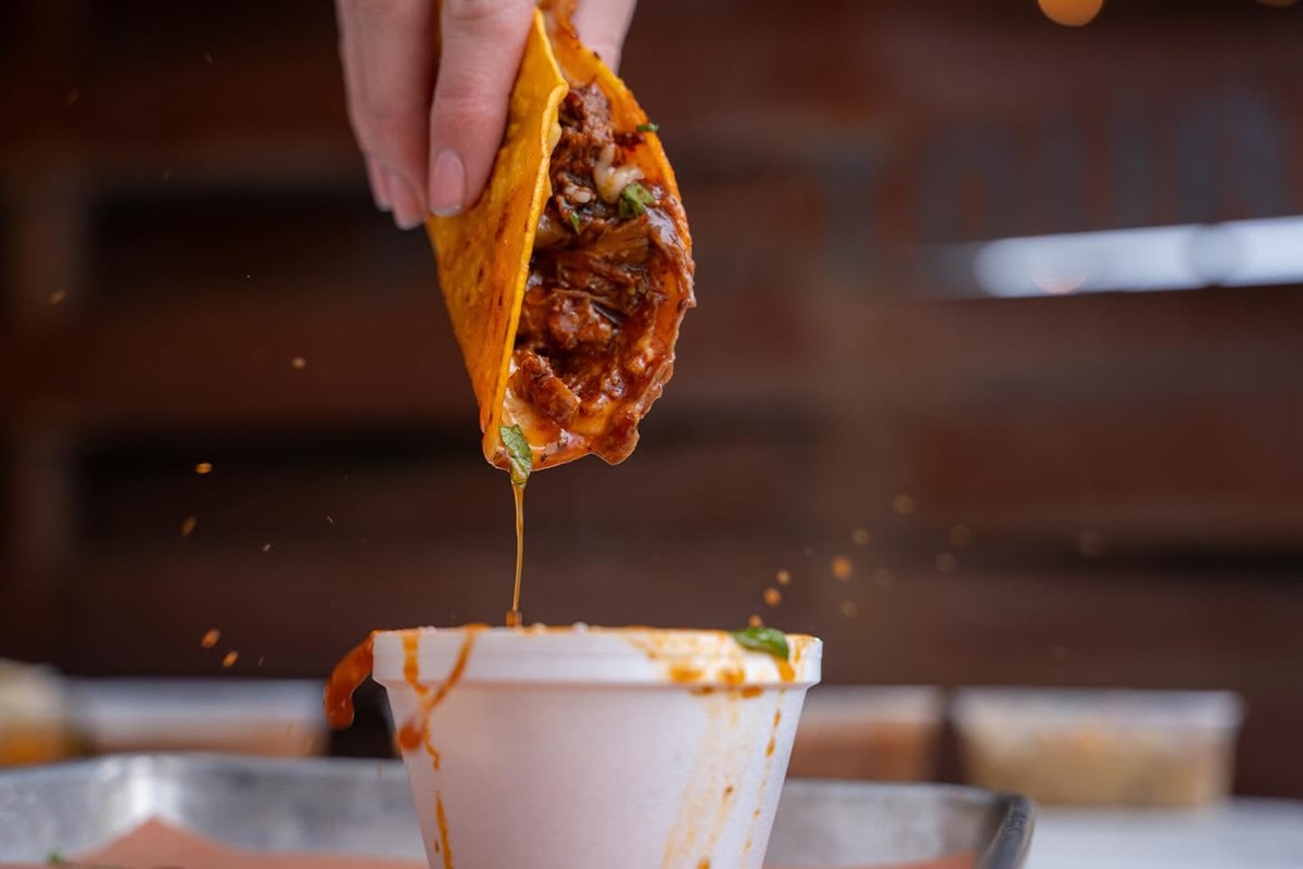 PHX_Caldwell County Mexi-Q_birria - DiningOut Dip, dip, dip that taco! | Photo courtesy of Caldwell County Mexi-Q