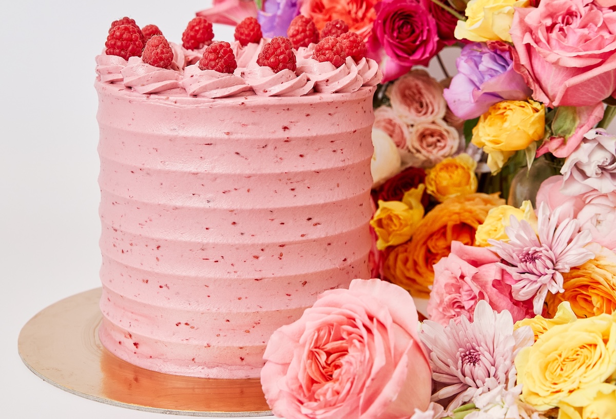 A cheery pink cake with rasberries. | Photo Courtesy of Too Sweet Cakes