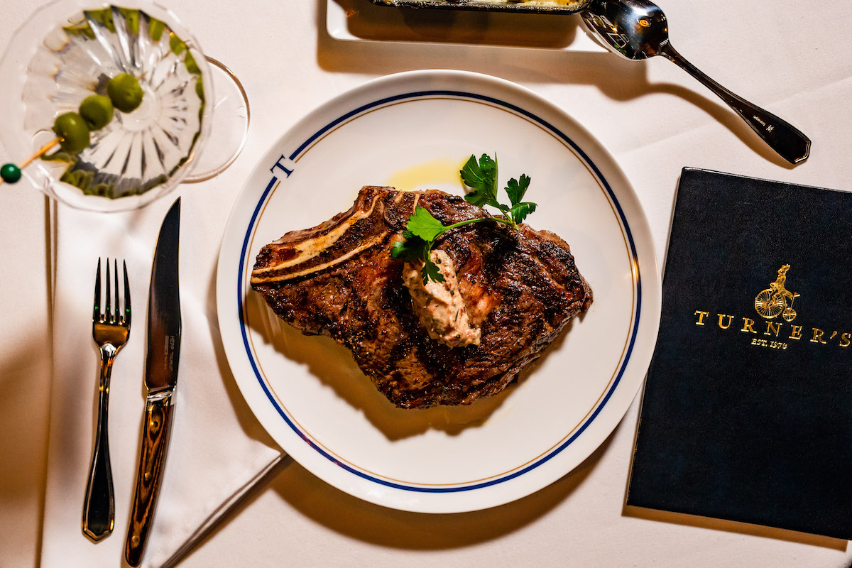 Prime bone-in ribeye at Turner's. | Photo by Kirsten Gilliam