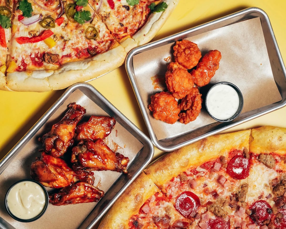 Pizza, wings and over-the-top comfort food are part of the lineup at Serious Eats, a nostalgic food hall-style destination at EpicCentral. | Photo by Serious Eats