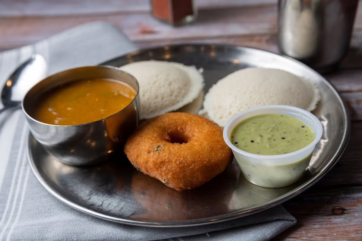 Shri Balaji Bhavan serves South Indian comforts, including idlis, medu vada, and sambar, alongside dosas and thalis. | Photo by Shri Balaji Bhavan