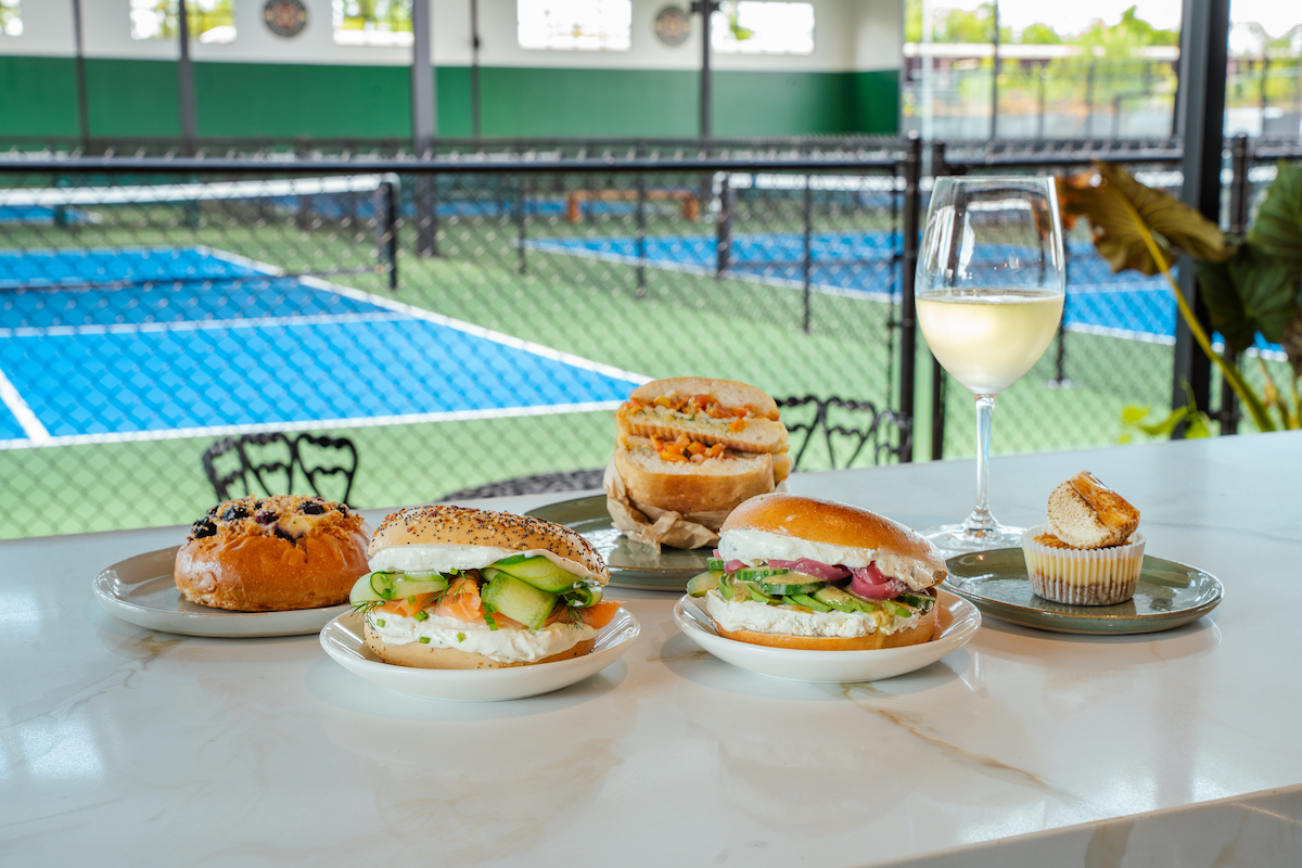 Long Point Social Club brings pickleball, padel and all-day dining together in Spring Branch, with LP Café serving coffee, bagels, pastries and other daytime bites overlooking the courts. | Photo by Hasan Yousef