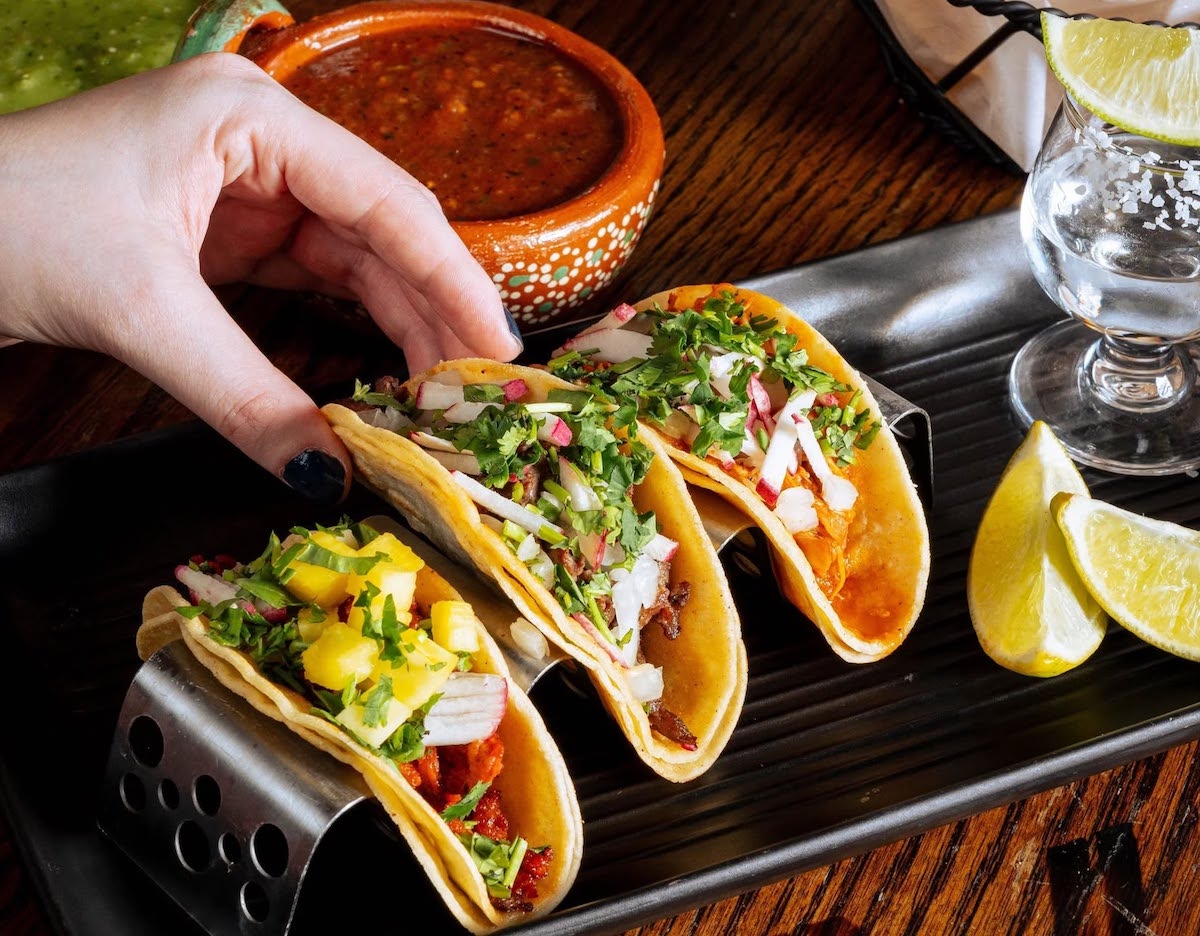 Tacos are among the modern Mexican offerings at Vidorra, an energetic EpicCentral restaurant known for its oversized margaritas and sizzling molcajetes. | Photo by Vidorra