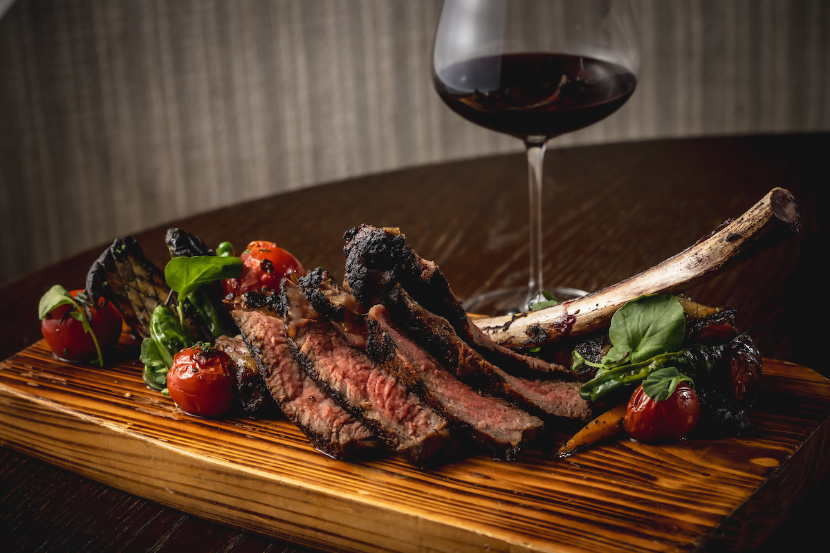 The 40-day dry-aged ribeye at Austin-based The Guest House, which opens in Dallas this October. | Photo by TJ Perez Photography