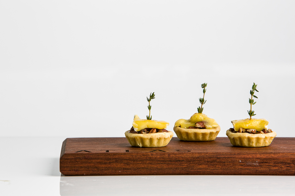 Chef Freddy Money’s pecan pie with Camembert and thyme combines familiar flavors with the polished presentation that defines Atlas. | Photo by Tomas Espinoza