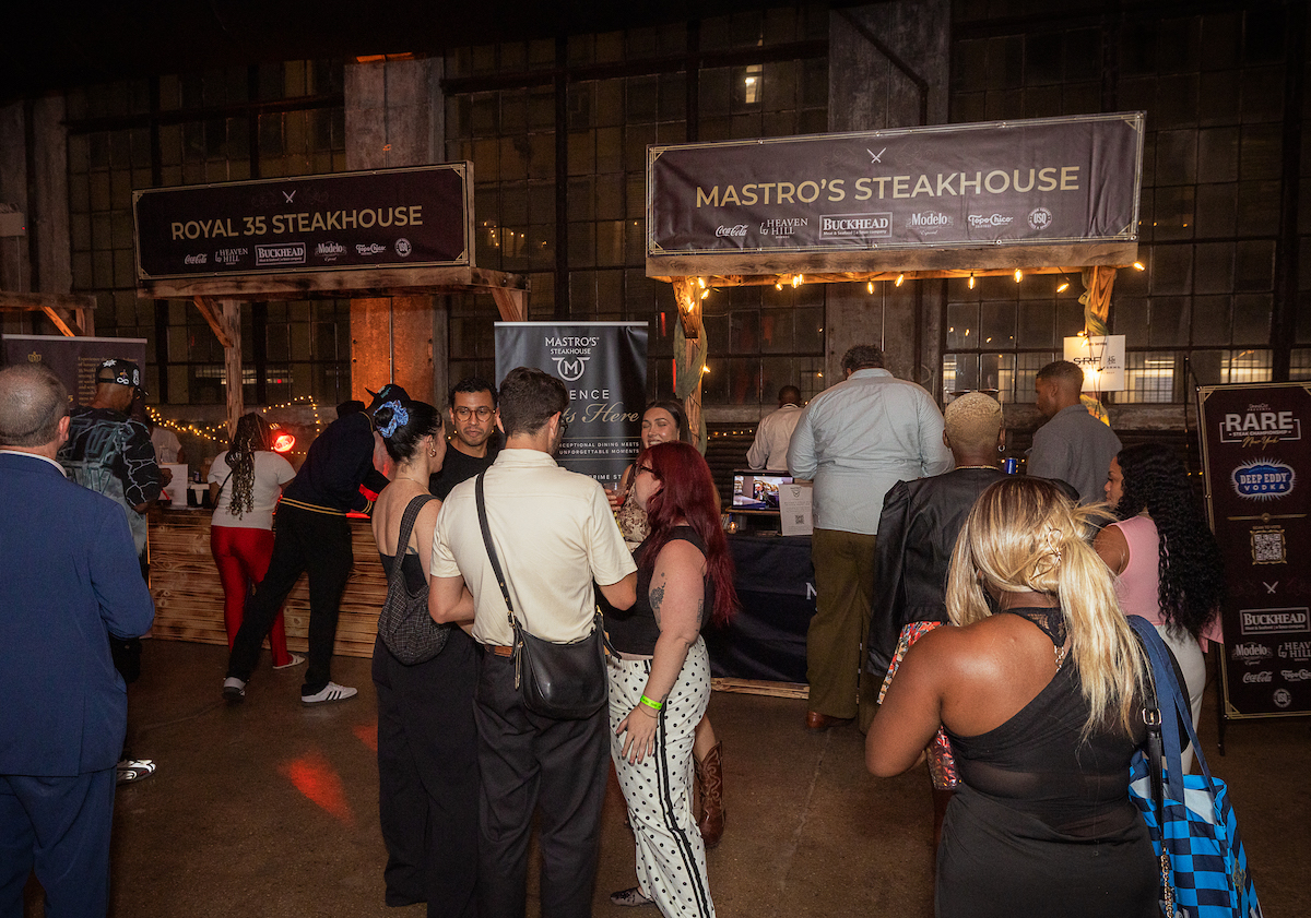 RARE NYC - DiningOut Guests make their way between restaurant stations, including Mastro’s Steakhouse, during RARE Steak Championship New York. | Photo by Guy Piaquadio