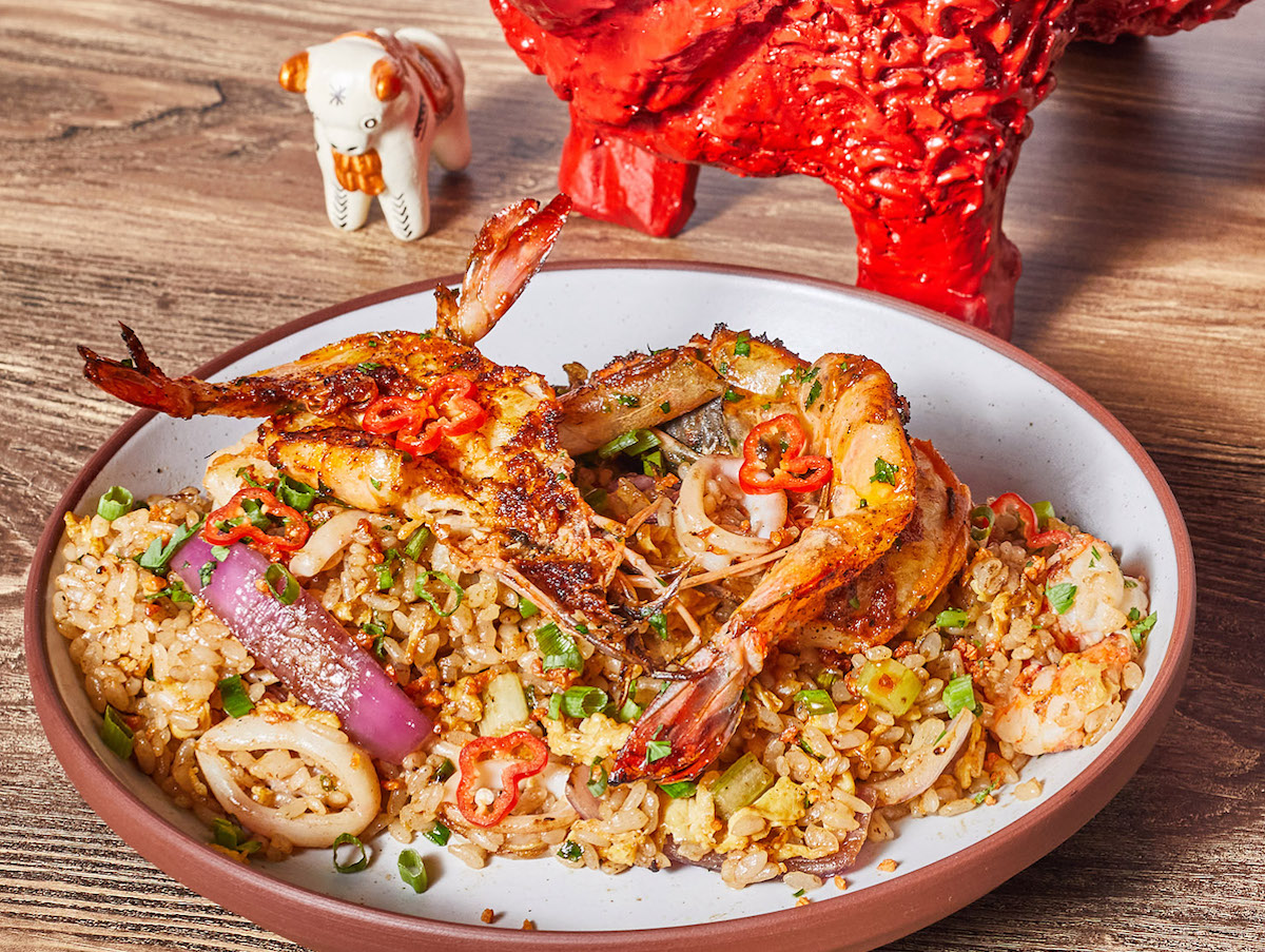Tio Lucho ATL - DiningOut Tio Lucho’s chaufa de mariscos pairs Peruvian-style fried rice with shrimp, squid, and other seafood. | Photo by Bailey Garrot