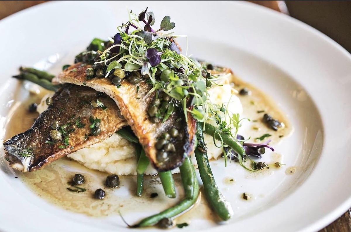 Little Alley Steak’s fish dishes prove there’s plenty worth ordering beyond the beef, with preparations that give seafood a starring role. | Photo by Little Alley Steak